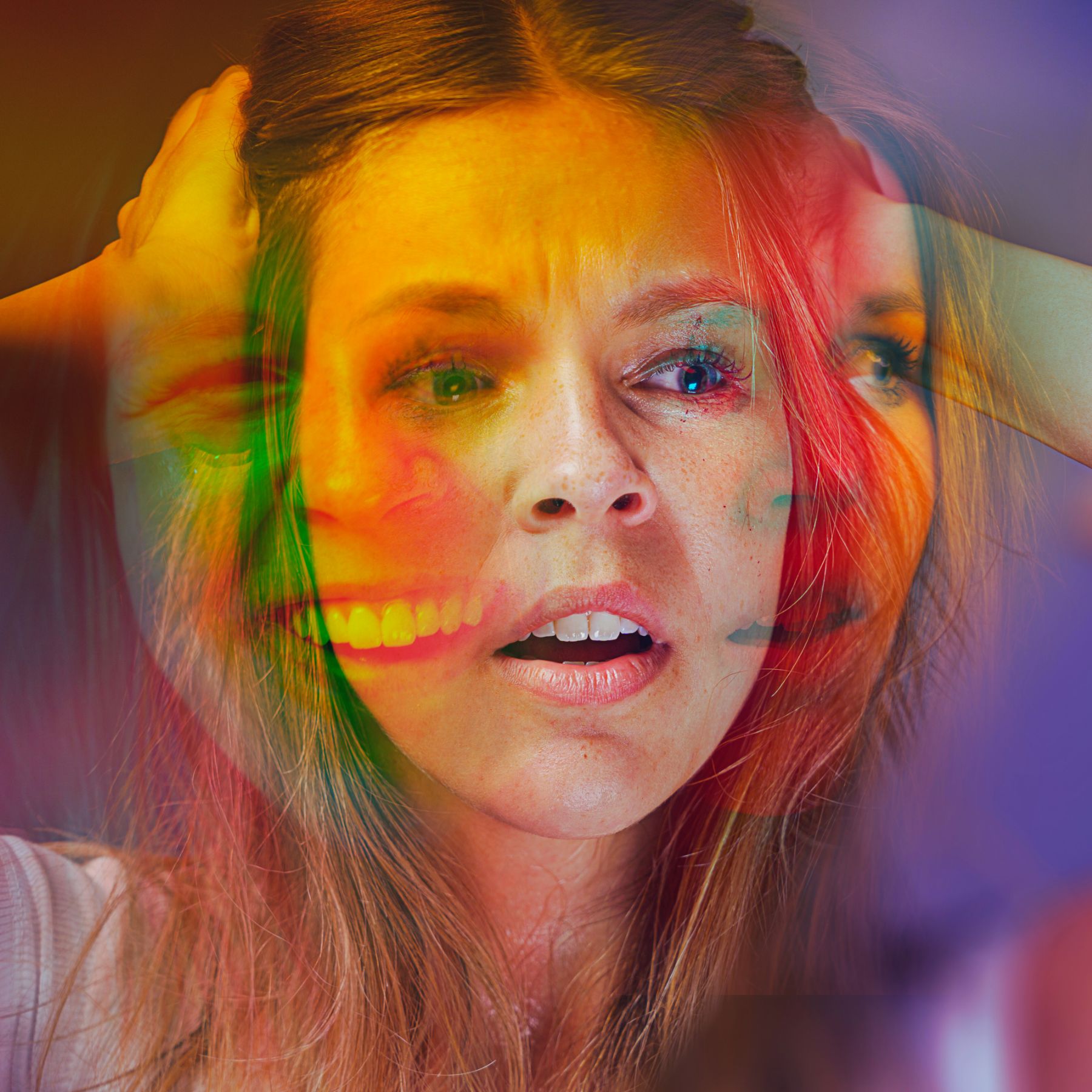 woman caught in the middle of two faces, bipolar disorder